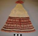 Man's finely knitted cap - cream top, red bottom with bird, flower and+