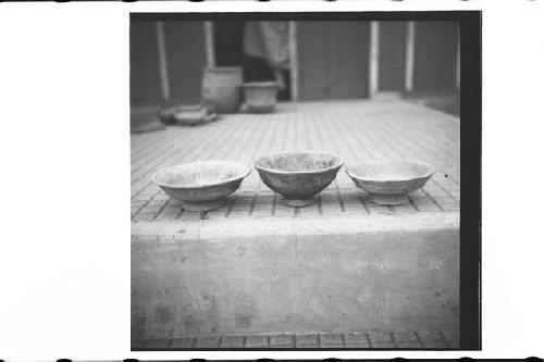 Three Orange Ware Annular-Based Bowls