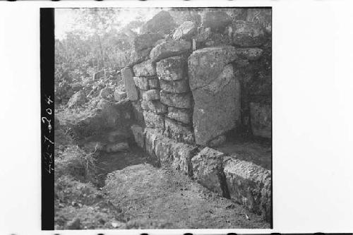 Outside of wall with plinth, Structure Q-142, East side