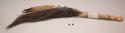 Arapaho dance wand. Wood handle w/ bison tail, feathers, beads, quill, & bells