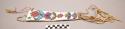 Beaded skin knife case - white background with multicolored design