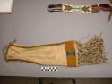 Pipe bag. Long piece of buckskin folded over and sewn up one side and