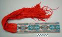 Belt or sash - woven beadwork with cloth back and long red wool fringe