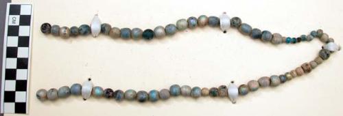 Strand of beads, glass, round, irridescent, graduated, blue tones