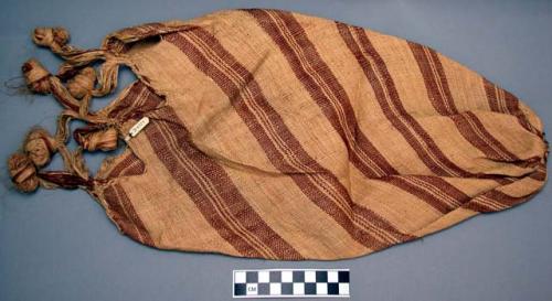 Palm or grass bag, one of three bags