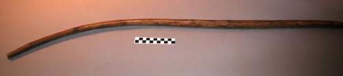 Wood bow decorated w/ drawings. Drawings of Indians, Anglos, fisk?, weaponry, an