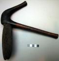 Etembo, the ceremonial hoe of the queen, wooden handle curved at hoe end; metal