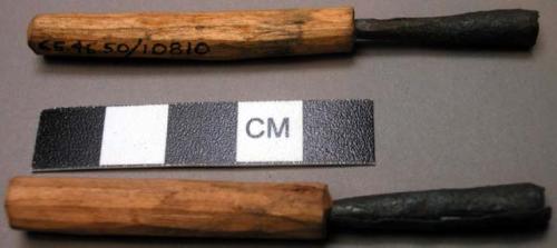 2 implements with wooden handles and metal tips, approx. 3" long