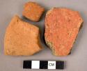 5 potsherds - worn, red ware, from smelter arca