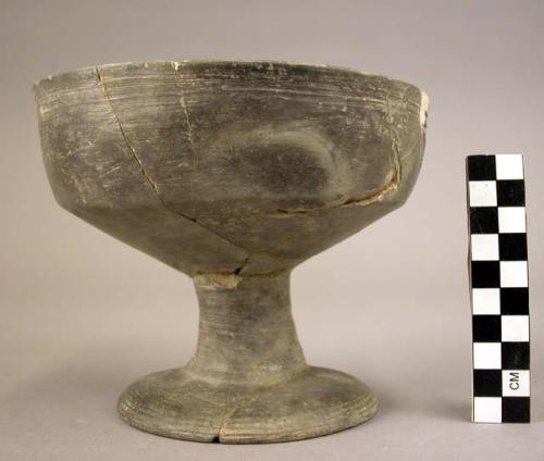 Footed pottery bowl - gray ware