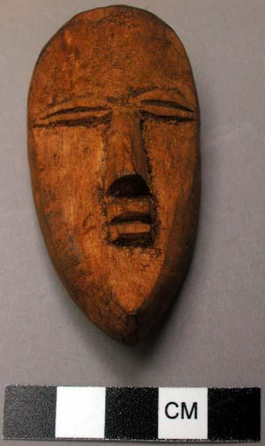 Small wooden mask.