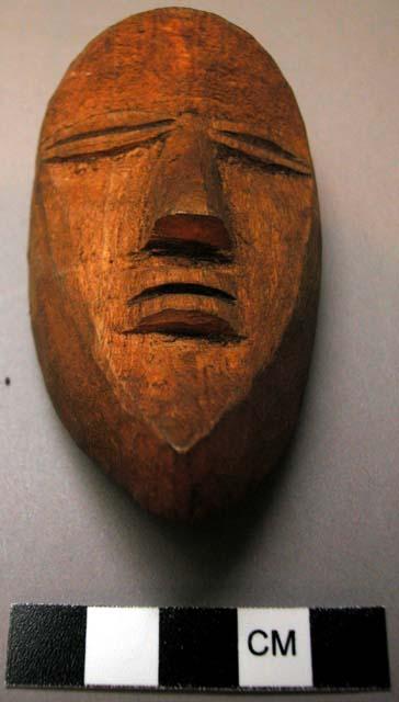 Small wooden mask.