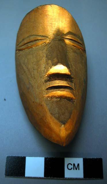 Small wooden mask.