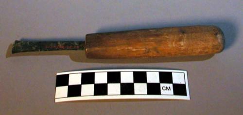 Small copper chisel hafted in wooden handle