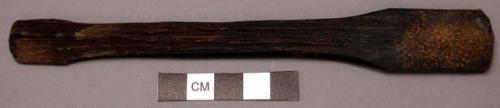 Small flat wooden spoon - used in applying poison to arrows