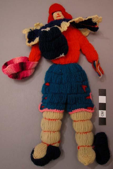 Red, blue and yellow woolen doll (male)