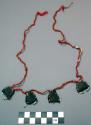 Love charm necklace - red and brown twisted wool cord on which are +