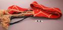Red woolen belt for man - finger technique, twined, with beige design +