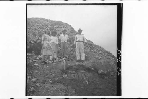 Pyramid in plaza, upper north face near west corner.  Excavation of Eligio Basta