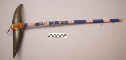 Plains staff, possibly Sioux. Wood handle covered w/ cloth and wrapped w/ beads