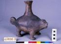 Ceramic vessel, effigy: head, 4 feet & curly tail - oppossum? thin neck.