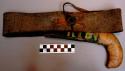 Knife sheath/ belt, stamped leather, brass buckle, green (oxidation?) on sheath