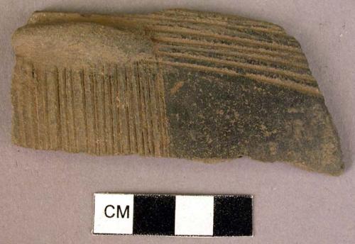 Black potsherd - thin incised pattern, 1 area not marked, 1 raised area