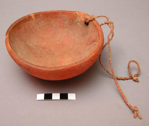 Crow wood bowl. Hand carved and covered w/ red pigment