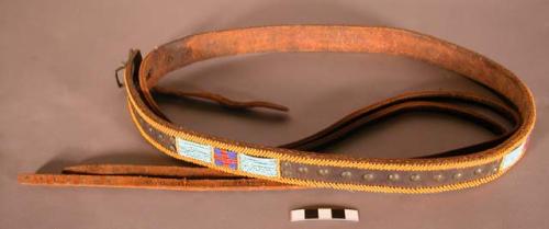 Beaded and brass studded belt