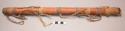 Arapaho flute. Fastened w/ leather thongs and string, carved wood over stop