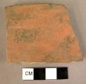 Rim potsherd of black on red painted ware