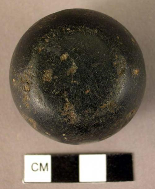 Hemispherical stone implement