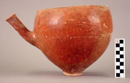 Large pottery bowl - Red Polished I Ware. Small flat base with long spout