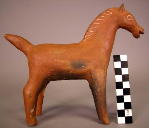 Ceramic burnished redware horse figurine.