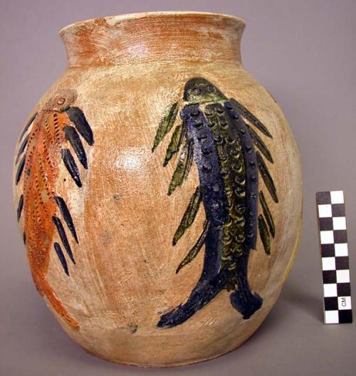 Ceramic polychrome jar with raised fish motif