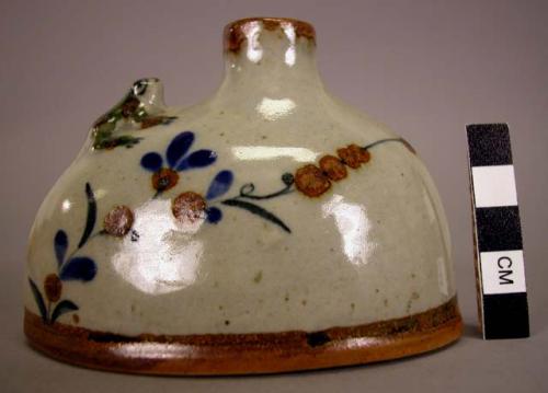 Ceramic narrow-necked vase with climbing frog