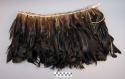 Sash, brown feathers with white fluffy tips bound onto cord, with ties