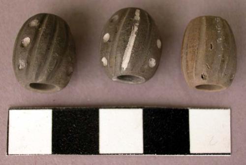 Pottery beads - engraved with lines and dots; filled in with white +