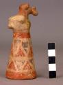Bird figure on top cone pottery. 4 1/4" l x 1 3/4" base- red & blue triangles on