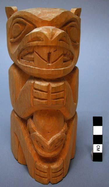 Carved wooden figure, composite bear and frog.