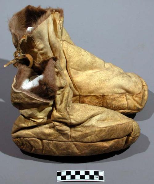 One pair of inner boots of skin--part of skin suit, (36-64-10/6147-6157).