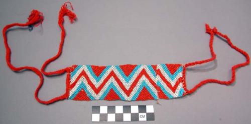 Man's bead collar - red, blue and white; geometric design; red cord tie