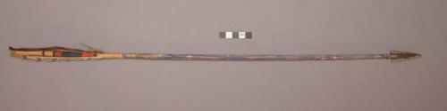 2 unidentified arrows w/ metal points held on w/ sinew. Shaft painted blue, and