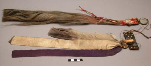 Horse tail and quill worked object and eagle feather ornament