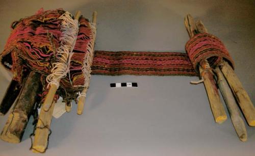 Belt loom with half finished woman's belt