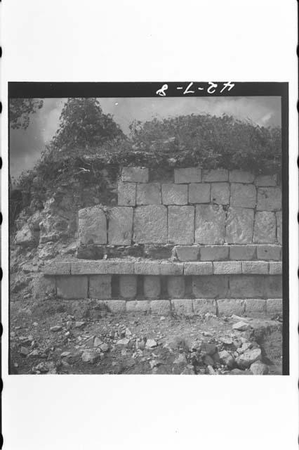 Detail of columnar Ornament at Center of Basal Moulding of East Facade