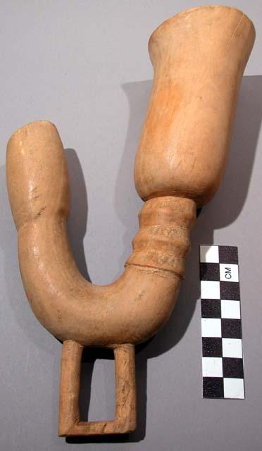 Pipe; carved wood pipe bowl; curved; rectangular element at bottom; cracked