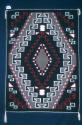 Klagetoh rug with concentric elaborately embellished diamonds