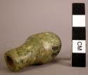 Ground stone bead, semi-tubular, greenstone