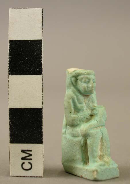 Ceramic figurine, miniature, green glaze, seated pharoh, broken